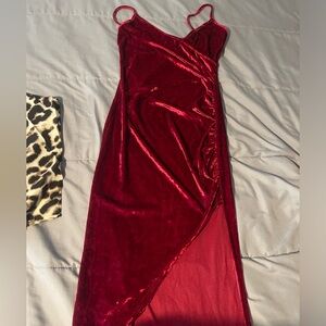 Burgundy velvet dress with a v neckline and high slit